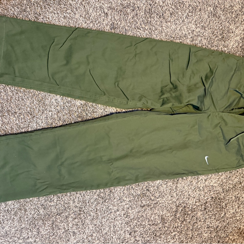 Green Nike twill pants, never worn still has tags on them. Size 30 Medium